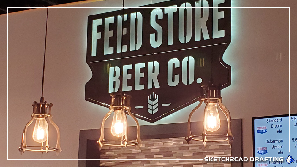 Custom fabricated light fixtures at the Feed Store Beer Company building located in Bloomfield, Indiana