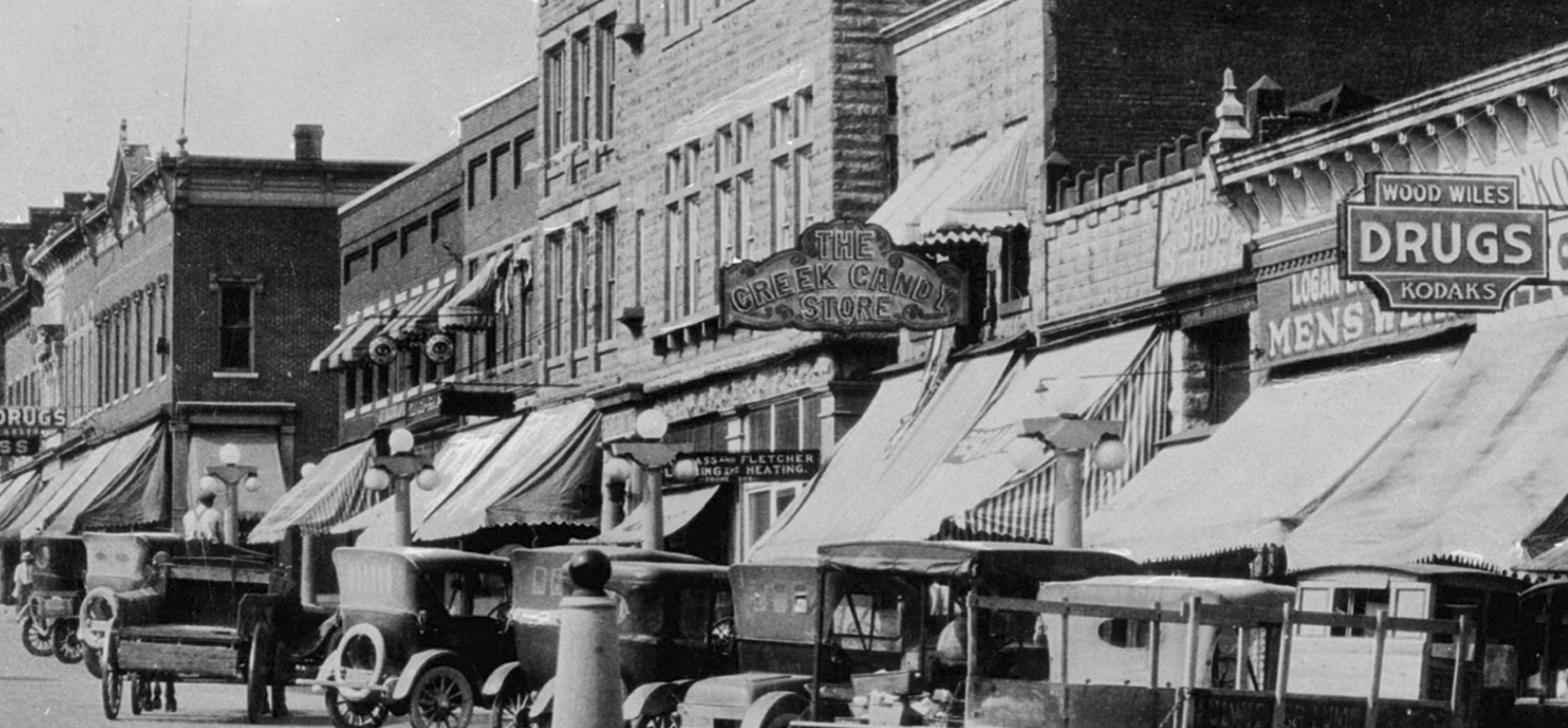 1920's view of the east side of the courthouse square on Walnut Street in Bloomington, Indiana