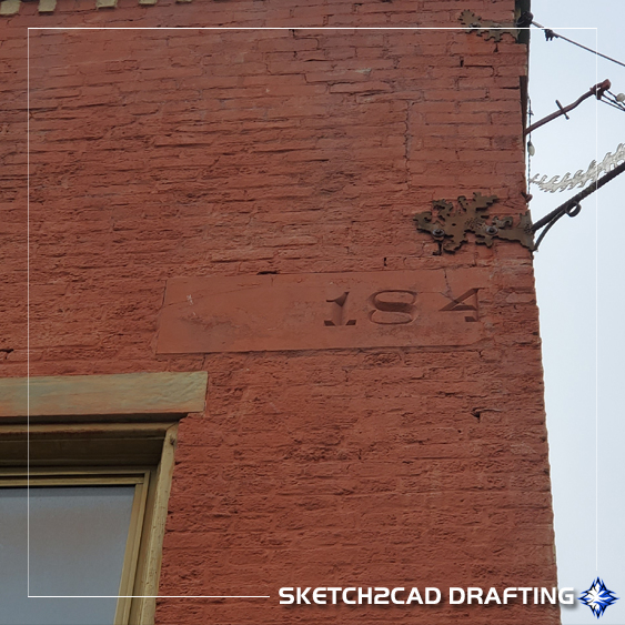 original walnut street hotel 1840's limestone date block at 124 North Walnut Street in Bloomington, Indiana