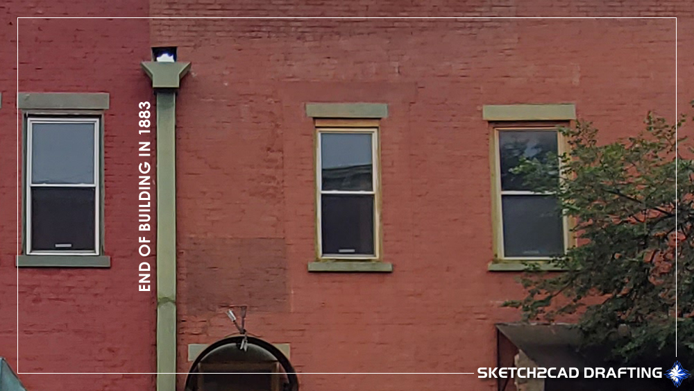 infilled brick area at 124 North Walnut Street in Bloomington, Indiana