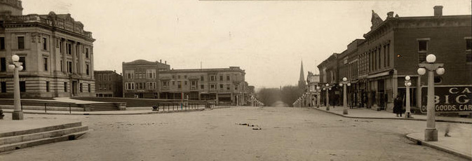 1907_college_ave_south_bloomington_no_lights 1907 college avenue looking south on the courthouse square in bloomington indiana showing downtown buildings no lights on the courthouse area