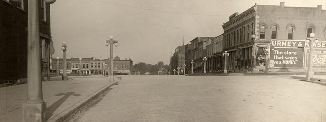 1907_sixth_west_bloomington 1907 sixth street looking west on the courthouse square in bloomington indiana showing downtown buildings